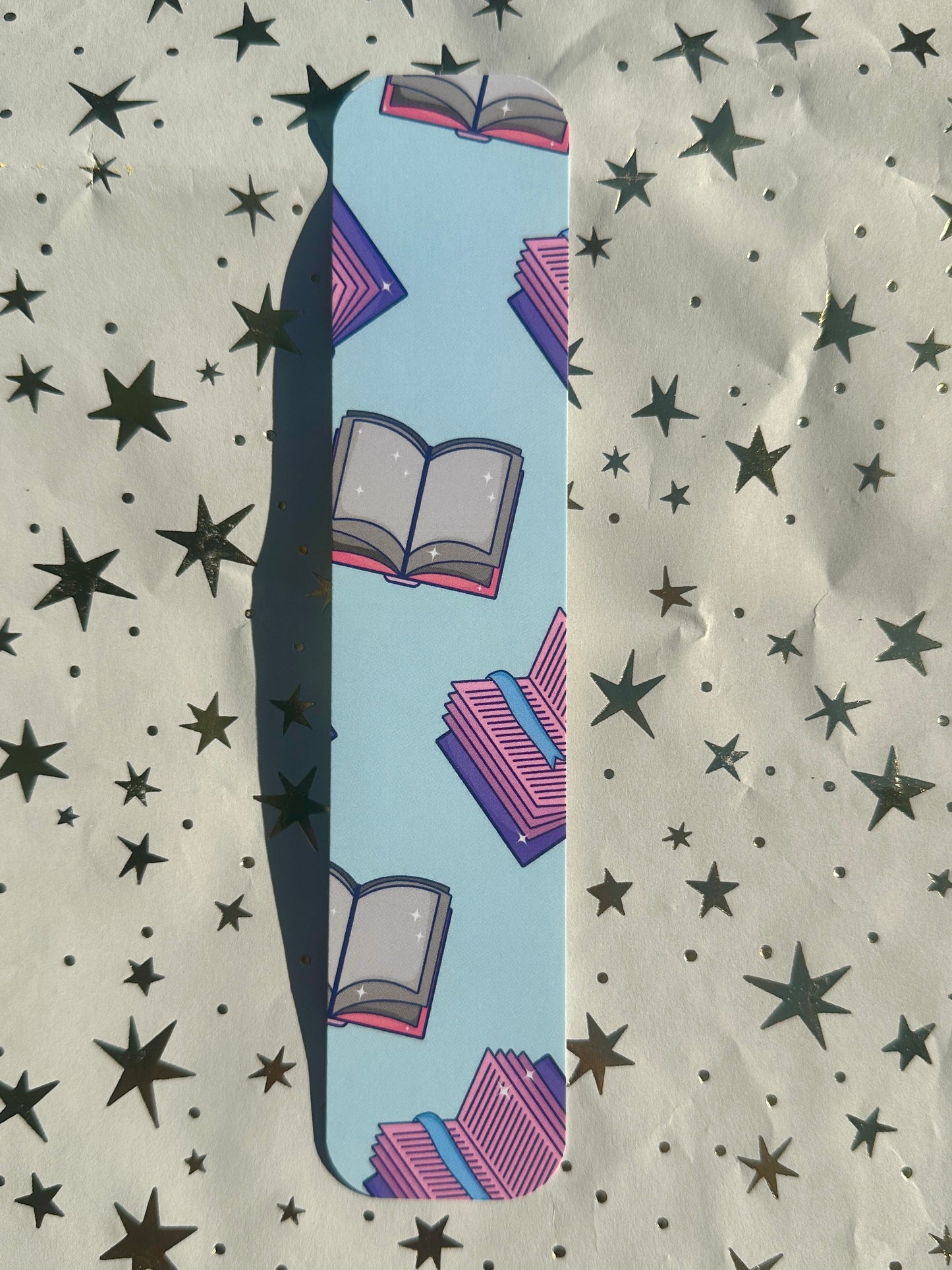 Blue and Purple Flying Books Bookmark